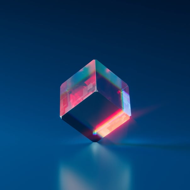 a red and blue cube standing verticaly on one of its corners